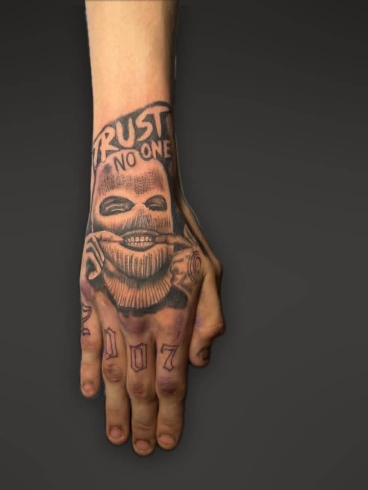 Trust no one hand tattoo by Dimitar Penchev